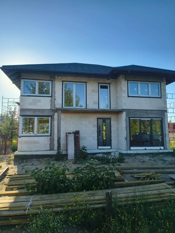 Realizacja Energooszczędne okna Abakus Rehau i niezawodne drzwi Martom